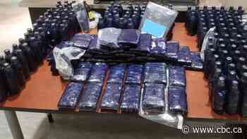 Parents charged for allegedly trying to smuggle $1.6M in drugs while with their children