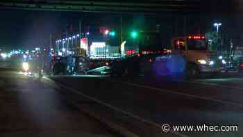 Woman hospitalized after car flips in Henrietta crash