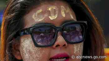 Pro-military marchers in Myanmar attack anti-coup protesters