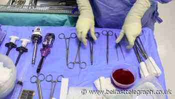 Doctor appears in court video call while performing surgery