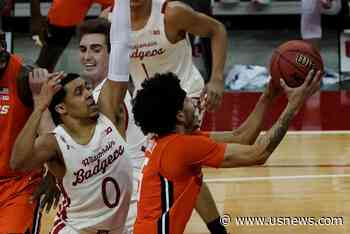 Illini Win 74-69 as Wisconsin's Trice-Led Rally Falls Short