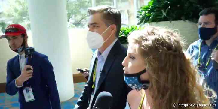 Trump supporters and right-wing reporters wouldn't stop heckling CNN's Jim Acosta during second day of CPAC