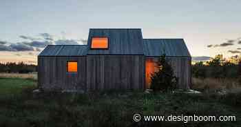 lookofsky architecture clusters timber volumes to realize its 'field house' in fårö, sweden - Designboom