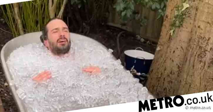 Joe Wicks takes ice bath to the extreme as he submerges himself in 170kg of ice: ‘It burns the skin’