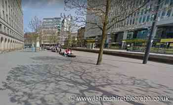 Shots believed to have been fired from car at another vehicle on St Peter's Square, Manchester