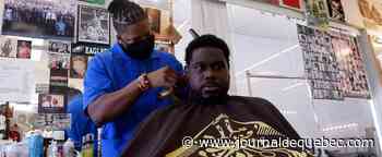 Un barbier afro-américain coupe court aux préjugés sur la COVID-19