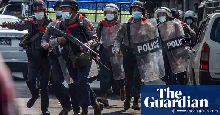 Myanmar police fire teargas and rubber bullets in violent crackdown on protesters – video