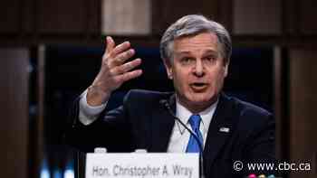 No evidence Antifa or 'fake' Trump supporters spurred Capitol riot, FBI's Wray testifies