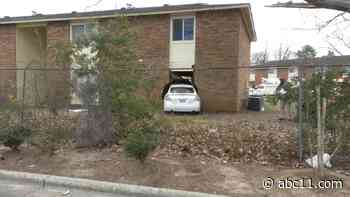 Driver hospitalized after veering off roadway, crashing into Fayetteville apartment