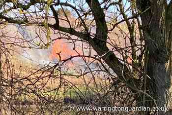 Firefighters tackle grass fire on Paddington Meadows