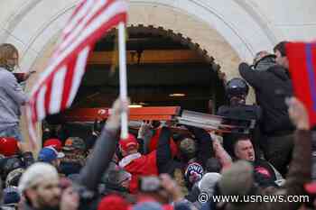 U.S. Suspends Federal Agent Who Joined Crowd Outside Capitol During Rampage, Lawyer Says
