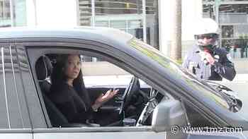 Kimora Lee Simmons Tries to Fight Traffic Ticket While Pleasing a Fan