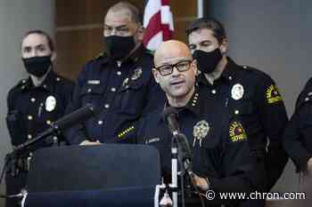 Dallas police officer charged with arranging two killings
