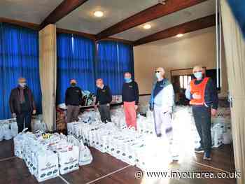 Rotarians help provide booster food packs with CHAT in Tiverton - In Your Area