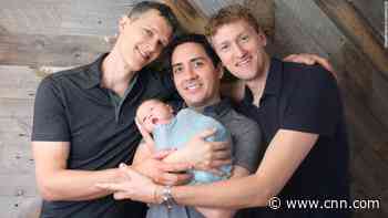 Three dads, a baby and the legal battle to get their names added to a birth certificate