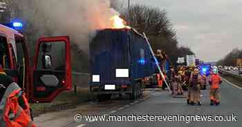 Road to remain closed 'across the night' after major lorry fire - Manchester Evening News