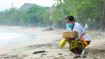 With Bali's hotels going under, Indonesia wants to reopen its holiday oasis. But can it work?