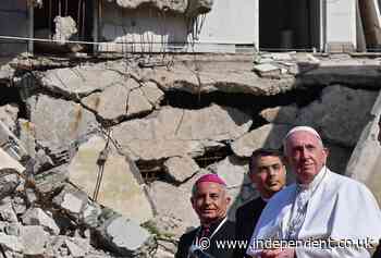 Pope prays for war victims during historic visit to former Isis stronghold of Mosul
