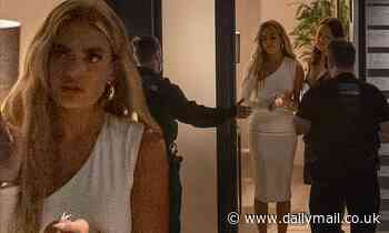 Megan Barton-Hanson is confronted by police on her doorstep after staging 27th birthday photoshoot