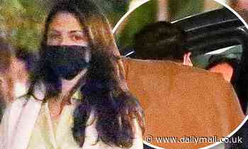 Eiza Gonzalez receives a goodbye kiss from a mystery man after finishing a dinner date in LA