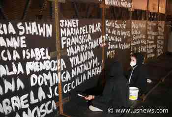 Feminist Activists Paint Barriers With Names of Victims in Mexico