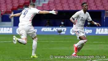 Atletico Madrid pegged back by city rivals Real with late Karim Benzema goal