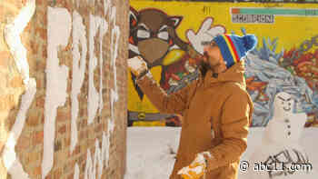 Snow graffiti artist 'tags' brick buildings in Chicago