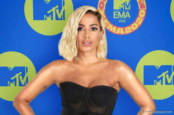 Anitta Claps Back After Arcangel’s Comments About ‘Ladies’: ‘If I Want to Show My Ass, I Will’