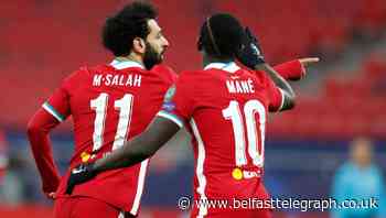 Liverpool put domestic troubles behind them to progress in Champions League