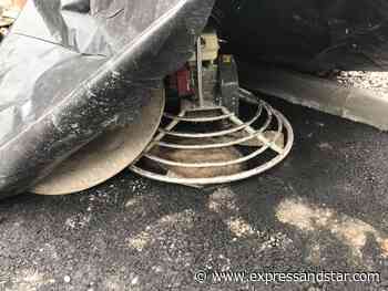 Sleepy badger rescued from under machinery at Dudley building site - expressandstar.com