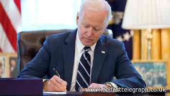 Biden signs 1.9 trillion dollars relief bill before speech to nation