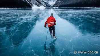 This Banff photographer captures stunning wild ice skating moments in the Rockies