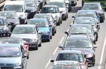 Motorists face delays in Bolton after vehicle crosses central reservation on M61