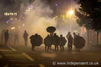 At least 100 protesters arrested as police kettle marchers in Portland