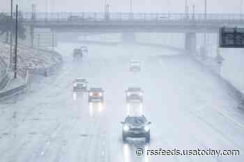 Snow blankets Denver in late season storm