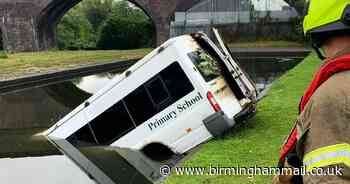 School minibus torched and dumped in canal in Dudley - Birmingham Live