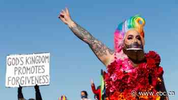 LGBTQ community rallies outside Victory Church in Regina