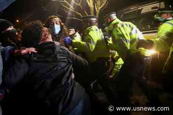 UK PM Johnson 'Deeply Concerned' at Footage of Police Breaking up Vigil