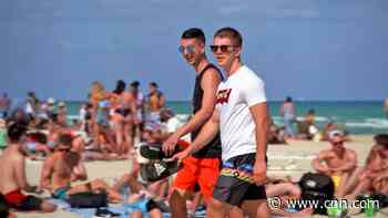 Experts fear virus variants will join travelers over spring break