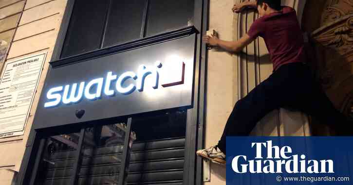 Lights off: France parkour collectives fight pollution one store sign at a time