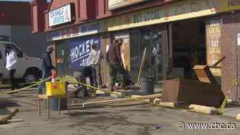 No injuries after car crashes through storefront in Saskatoon - CBC.ca