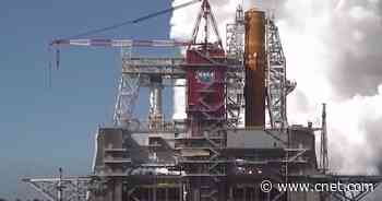 See NASA's huge Artemis moon rocket roar to life in dramatic hot-fire test     - CNET