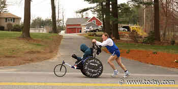 Boston Marathon icon Dick Hoyt, who pushed son in wheelchair for 32 races, dies