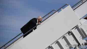 Biden '100 percent' fine after stumble on Air Force One steps, aide says