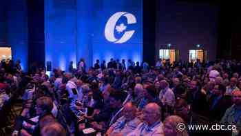Conservatives debate whether to declare that 'climate change is real' at policy convention