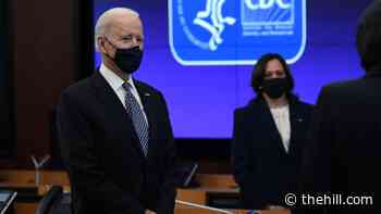 Biden jabs Trump in first visit to CDC