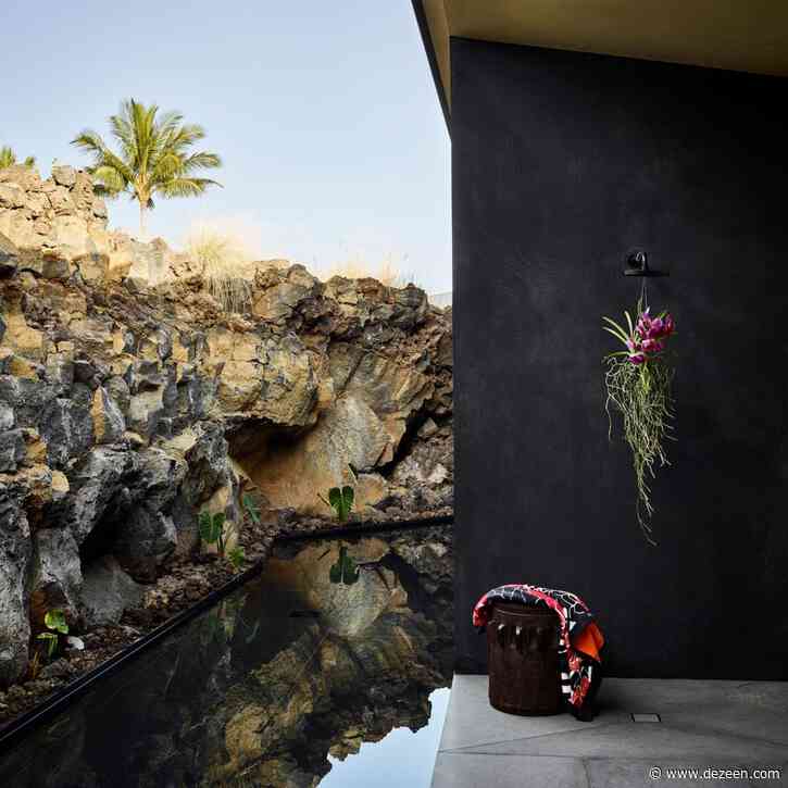 Hawaii house by Walker Warner Architects house hugged by volcanic rock