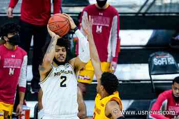 The Latest: Michigan's Livers Dons #NotNCAAProperty Shirt