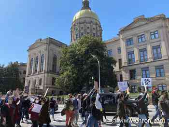 Hundreds in Atlanta rally against hate after spa shootings