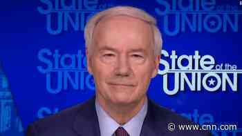 Arkansas governor says he signed near-total abortion ban so Supreme Court can decide if it's a 'direct challenge' to Roe